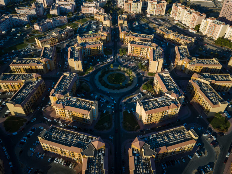 Aerial,View,Of,International,City,In,Dubai,,United,Arab,Emirates